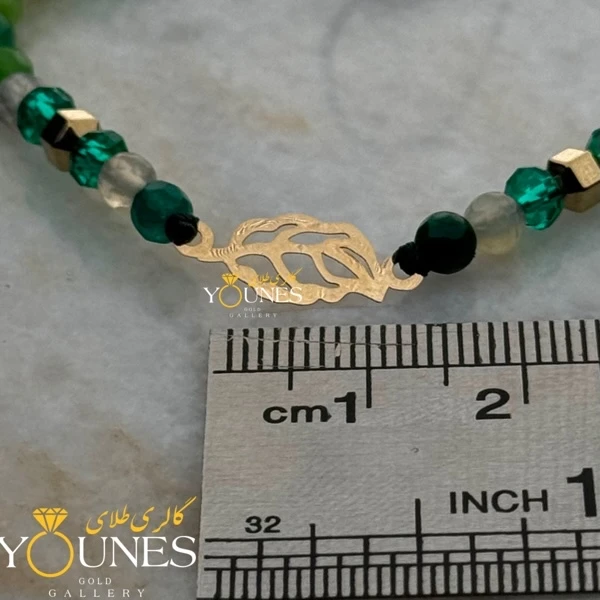 دستبند برگ آمازون طلا لیزری